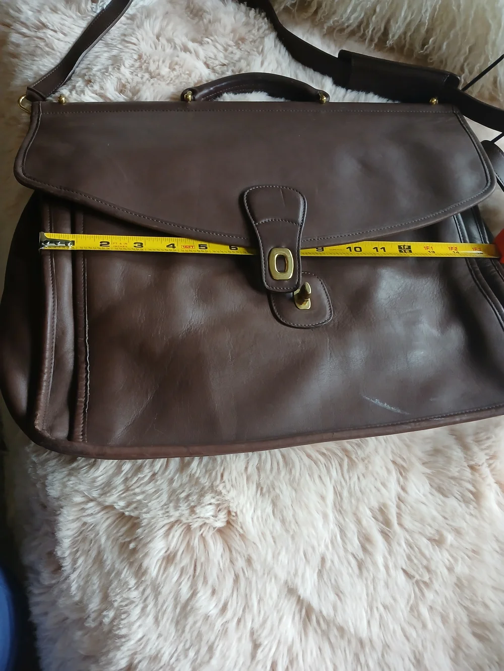Classic Brown Leather Messenger Bag with Gold Hardware Coach.